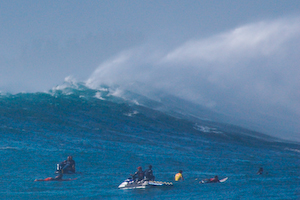 Large wave swinging wide of the lineup and hitting across the bay at Waimea.